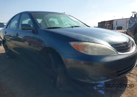 2003 Toyota Camry Le z USA, uszkodzony, nr VIN 4T1BE32K93U658998